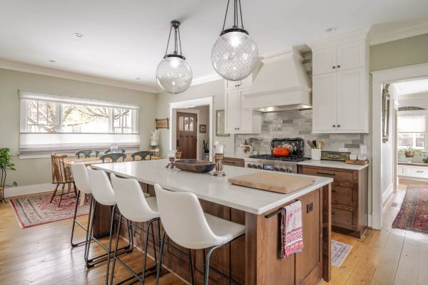kitchen island with white barstools