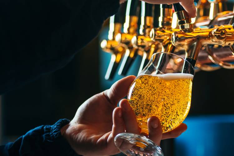 Beer being poured from a tap