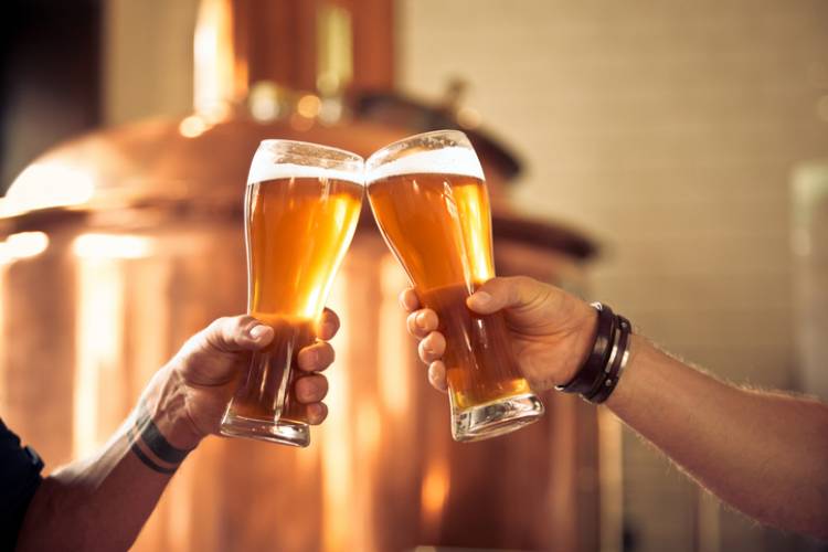 Friends cheers at a local brewery