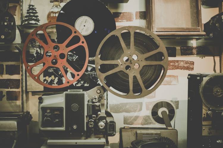 vintage film machine, black and white with red