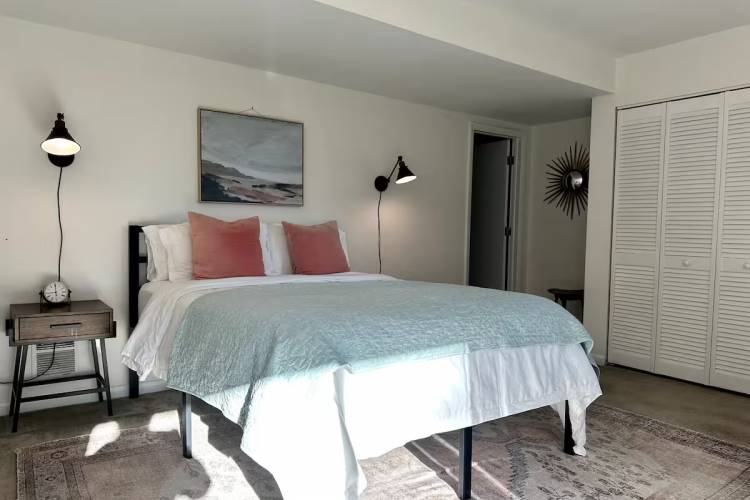 Happy Hoos Studio Pictured: Queen bed and nightstands in Happy Hoos