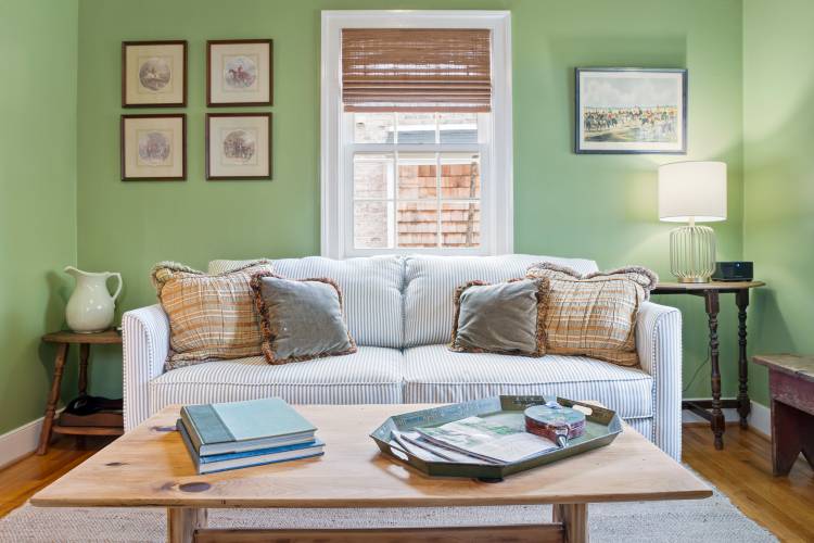 Devon Cottage Pictured: Living Room with couch and coffee table at Devon Cottage