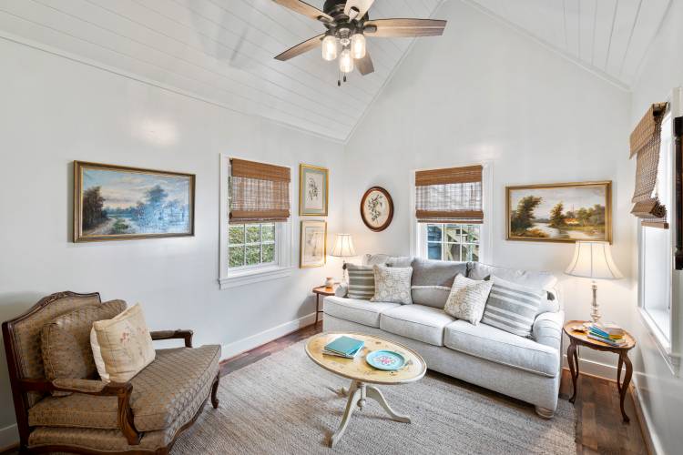 Somerset Cottage Pictured: the living room with a lofted ceiling at Somerset Cottage